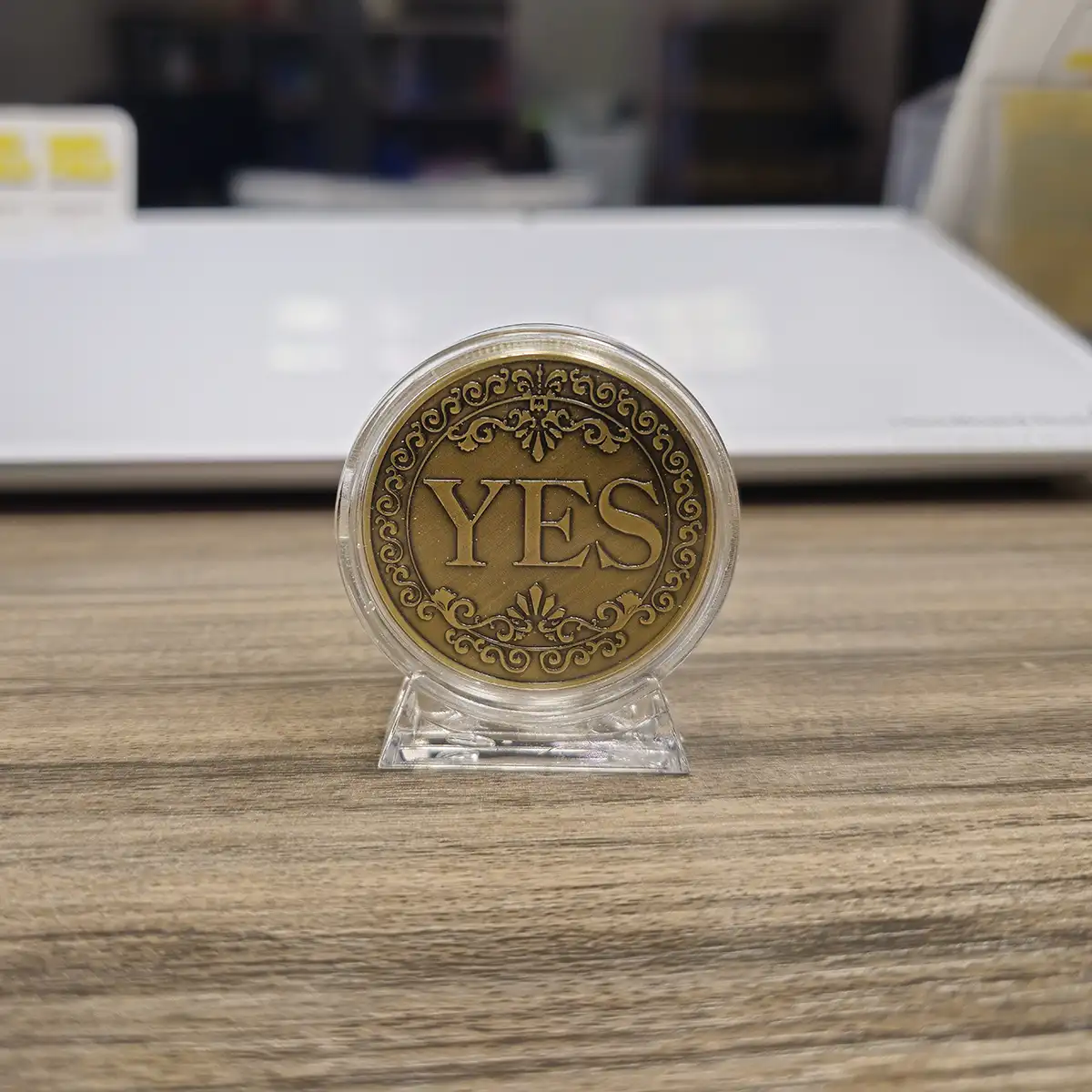 Decision coin yes in display case