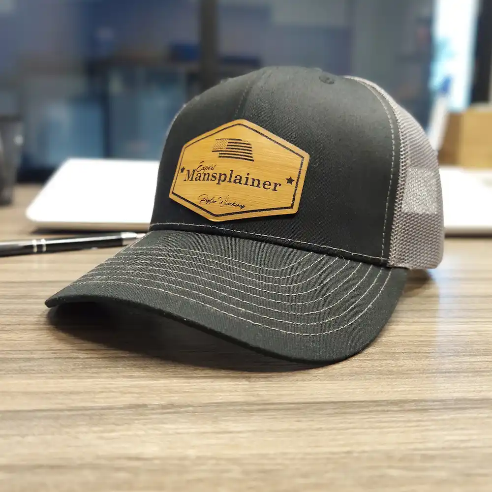 Expert mansplainer trucker style hat