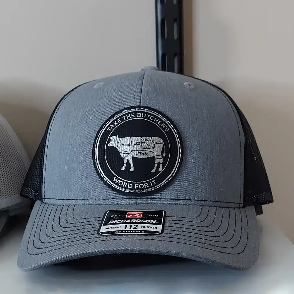 Butcher's word design on a trucker style hat from Poplar Workshop