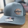 Bass Hole design on a trucker style hat from Poplar Workshop